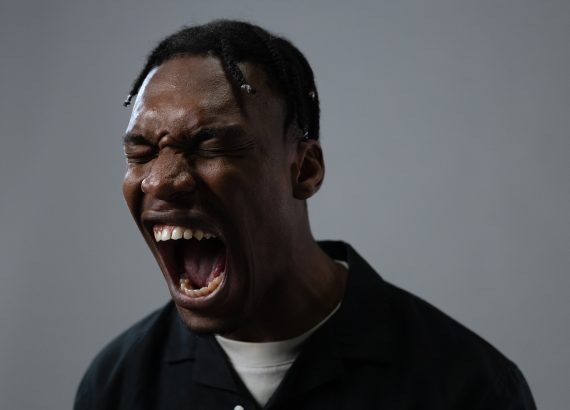 Yound black man showing anger emotion